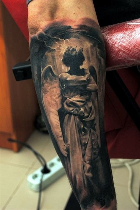 Dark angel tattoo on arm - Tattooimages.biz