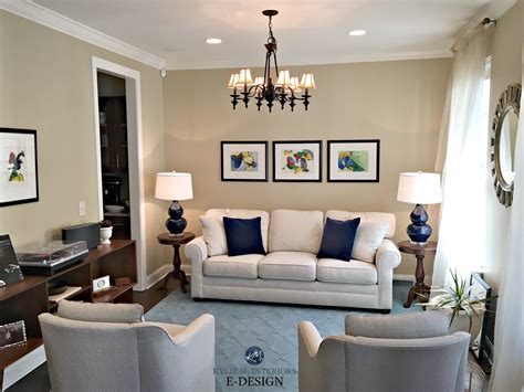 Home staging in living room with balance, navy blue accents. Similar to Sherwin Williams Sandbar ...