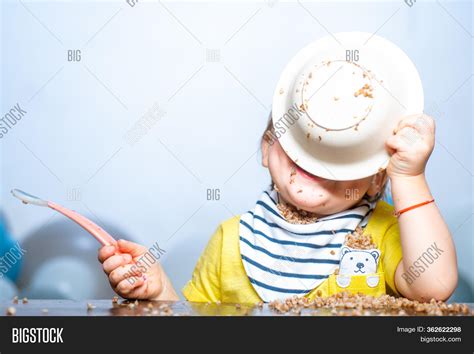 Funny Baby Eating. Image & Photo (Free Trial) | Bigstock