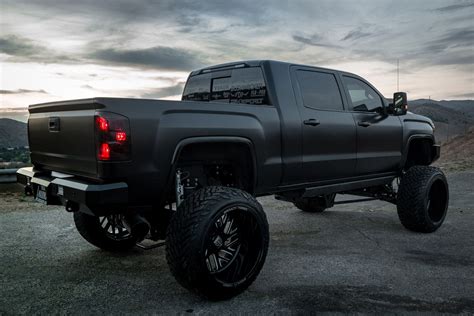 GMC Sierra Denali Gone Wild With Body Lift and Custom Lighting ...