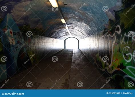 Underground Tunnel with Graffiti Stock Photo - Image of grafitti, light: 126599398