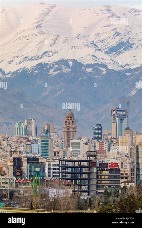 Islamic Republic of Iran. Tehran. City center and mountainous background Stock Photo - Alamy