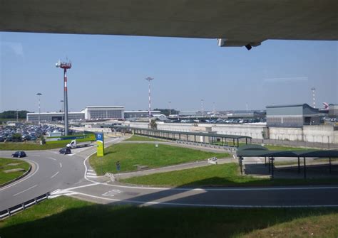 Milan Malpensa Airport. Direct flights. Connections to center by bus train