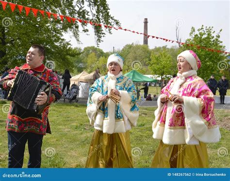 Performers of the Russian National Folklore Ensemble Act during the Holiday in the Park ...