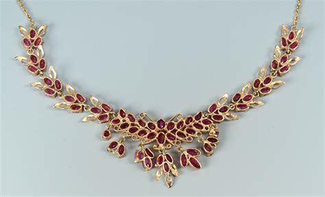 Lot 3088231: 14k Ruby Stone Necklace and Ballerina Ring | Case Auctions