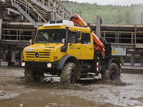 Photos of Mercedes-Benz Unimog U5000 L Double Cab 2000–13 (2048x1536)