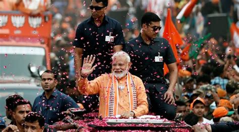 PM Modi draws massive crowd at Varanasi roadshow; Congress keeps Priyanka Gandhi out of race ...