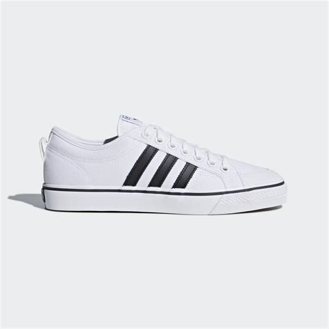 adidas Nizza Shoes - White | Unisex Lifestyle | adidas US | Sneakers, White adidas, Mens casual ...