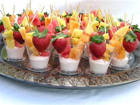 Create a display of fruit kabobs using a 1/2 watermelon and the NEW Pretty Party Skewers ...