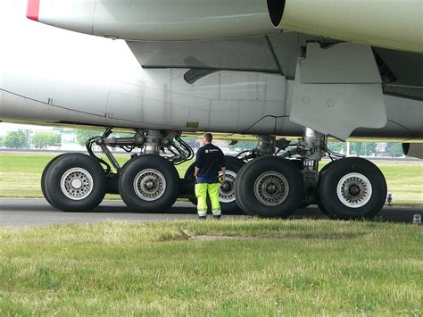 A guy standing next to an Airbus A380 landing gear : r/aviation