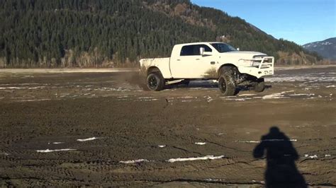 Lifted diesel trucks mudding - YouTube