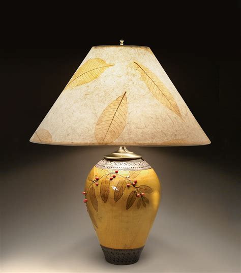 Yellow ceramic table lamp gives highlights to any zone of your room - Warisan Lighting