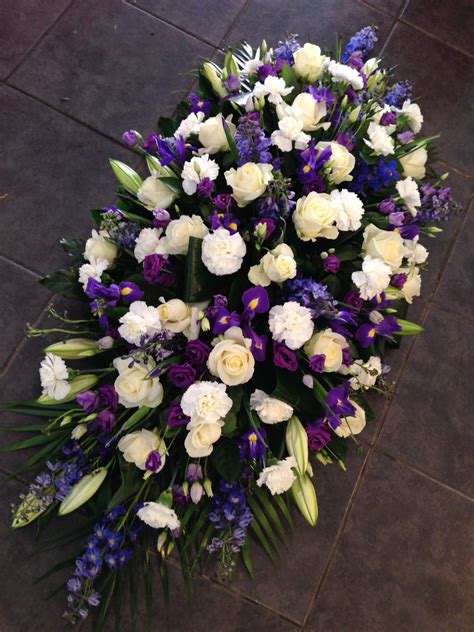 Blue and white casket spray | Funeral flower arrangements, Funeral floral arrangements, Funeral ...