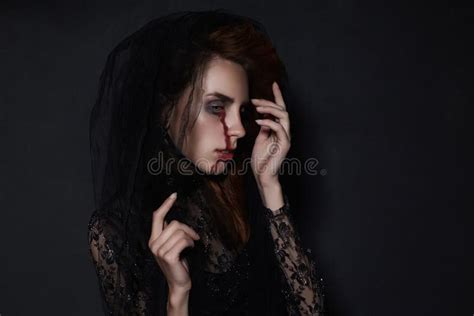 Woman with a Bloody Face Make-up Stock Image - Image of flowers, fashionable: 102862223