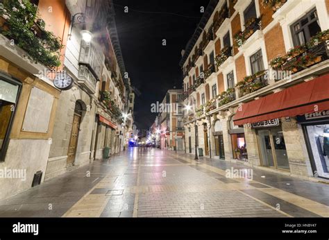 Leon, Spain - August 22, 2014: Night scene of typical street in downtown of medieval Leon city ...