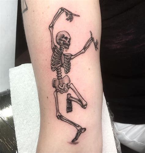 small dancing skeleton tattoo - ohioteendiesinvan