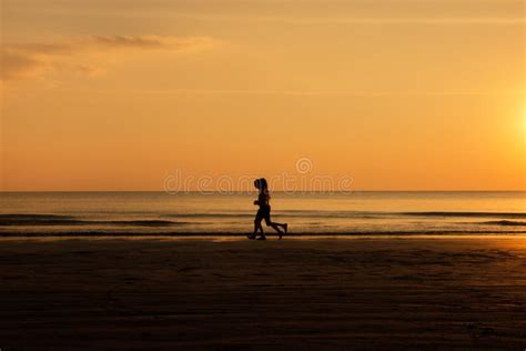 Silhouette of People Running on the Beach at Sunset, Healthy Lifestyle Stock Image - Image of ...