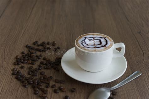 Coffee in a Mug and Beans on a Wood Grain Background Stock Photo - Image of porcelain, aromatic ...