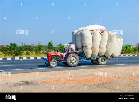 RAJASTHAN, INDIA - FEB. 24: timber transport with tractor on country ...