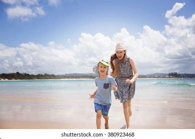 Children Running Barefoot On Sandy Beach Stock Photo 380923468 | Shutterstock