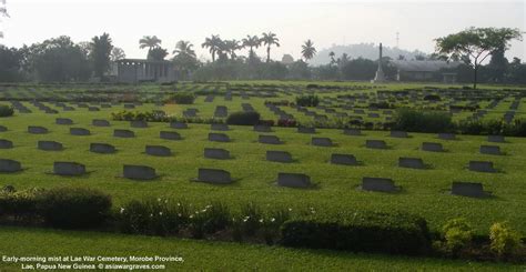 Early-morning mist at Lae War Cemetery, Morobe Province, Lae, Papua New Guinea - asia war graves