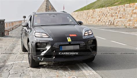 2023 Porsche Macan EV Spotted Testing In The Alps Alongside Cayenne | Carscoops