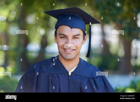 Graduation, portrait and man with smile to celebrate success, education and college scholarship ...