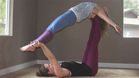 7 Must-Try AcroYoga Poses | Wanderlust AcroYoga teacher Deven Sisler