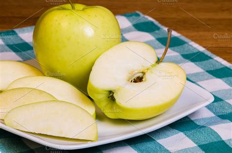 Golden delicious apple | High-Quality Food Images ~ Creative Market