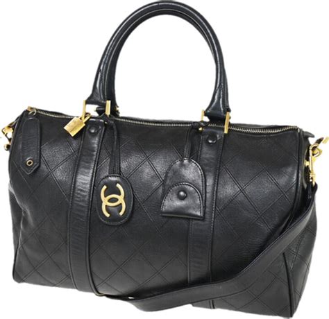 Chanel Leather travel bag - ShopStyle