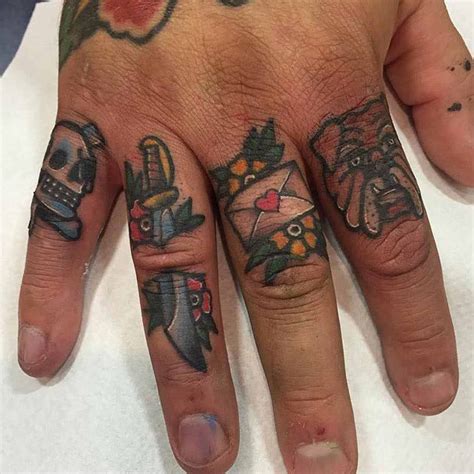 small traditional tattoos on fingers Brass Knuckle Tattoo, Knuckle Tattoos, Finger Tattoos, Hand ...