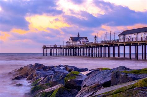 Southwold Pier in Suffolk, UK at Sunset Stock Photo - Image of pink, harbor: 77824710