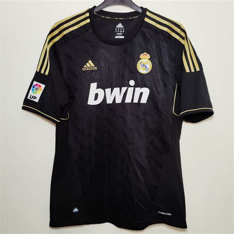 Real Madrid Away football shirt 2011 - 2012. Sponsored by Bwin