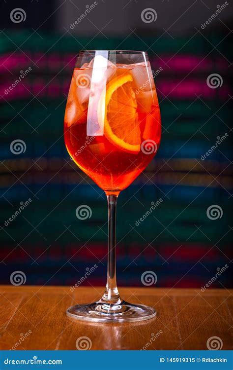 Aperol Spritz Cocktail in Glass on Wooden Table in the Interior of the Restaurant. Stock Image ...