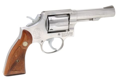 #4: A BOXED STAINLESS STEEL SMITH & WESSON 38 CAL REVOLVER