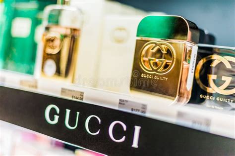 Bottles of Perfume by Gucci on a Store Shelf Editorial Stock Photo ...