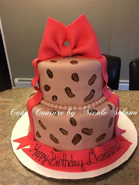 Leopard print cake with red bow