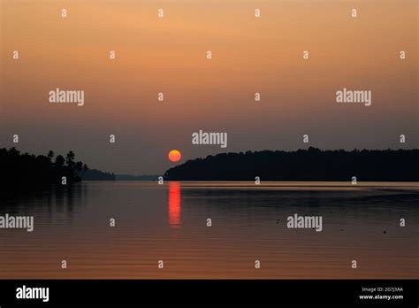 Dark Sunset In Ashtamudi Lake Kollam Stock Photo - Alamy