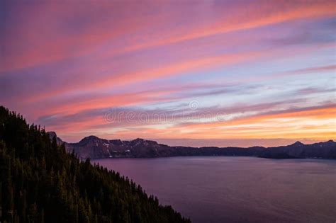 Pink Streaks Light Up the Sky Over Crater Lake Stock Image - Image of clouds, overlook: 276957169