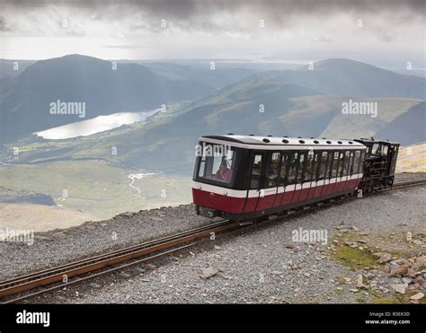 Snowdon Mountain Railway train, summit of Snowdon, Snowdonia National Park, Gwynedd, Wales, UK ...