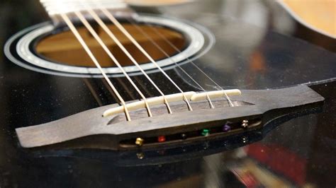 How to lower acoustic guitar strings | Guitar World