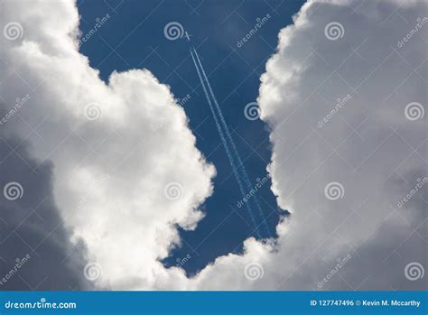 Airliner Flying Above Storm Clouds Stock Photo - Image of commercial, billowing: 127747496