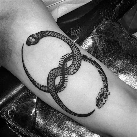 15 Snake Skeleton Tattoo Designs & Ideas - PetPress