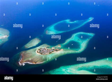 Aerial view of atolls in the ocean, Maldives Stock Photo - Alamy