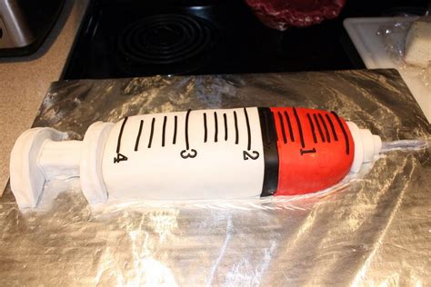 Big Shot Syringe Cake - Cake by Michelle - CakesDecor