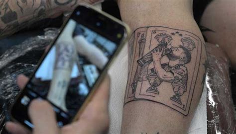 More than skin deep: Fans line up for Messi tattoos