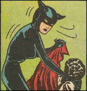 Miss Fury informs a foe how she feels about his activities. Artist: Tarpe Mills.