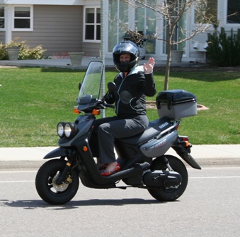 Debbie on her scooter