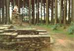 Ruins of tower WP12/77 in the Mahdholz near Rainau, with a section of reconstructed wll beyond.