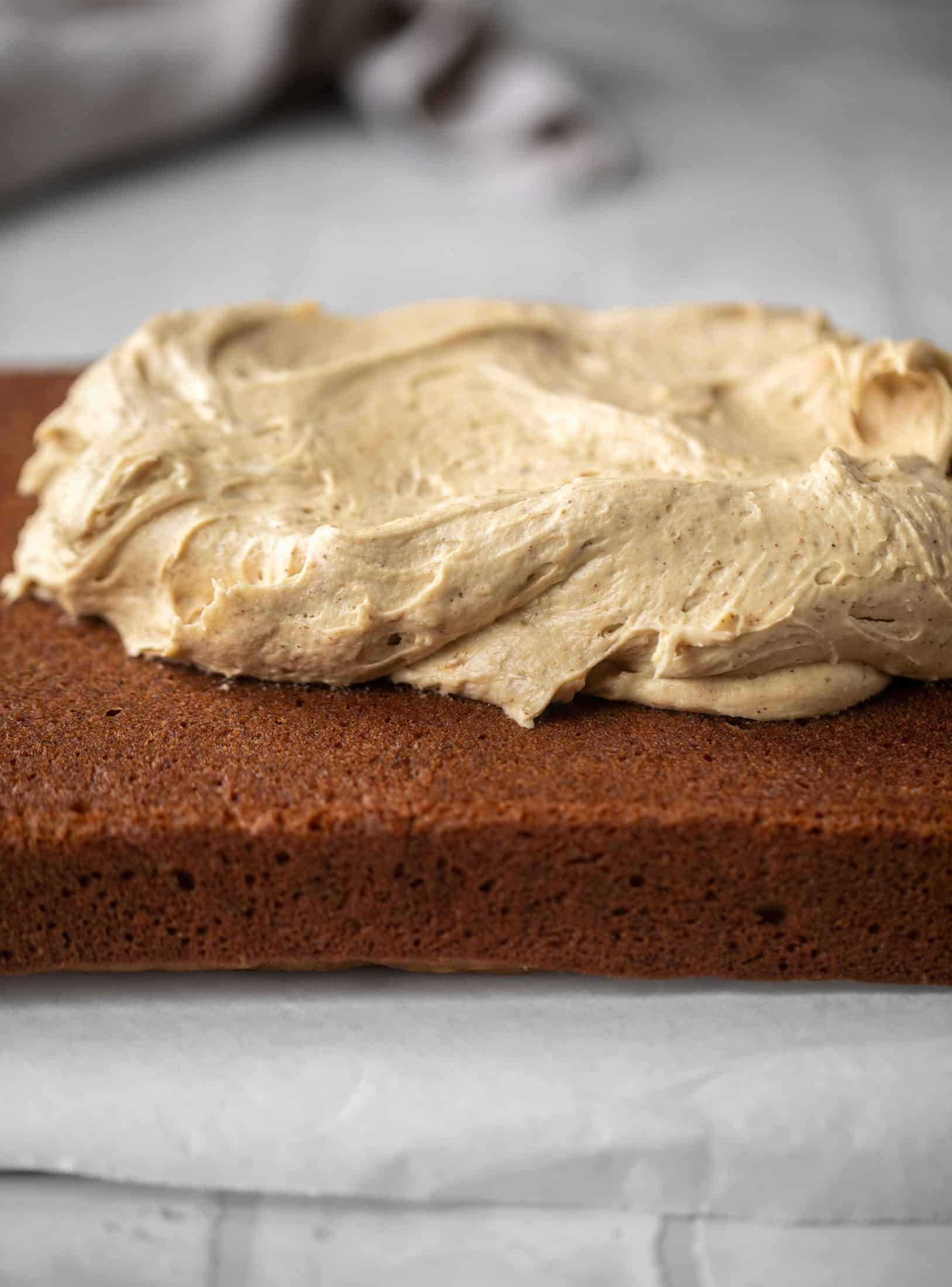 This banana cake is a delicious twist on banana bread! Covered with coffee cream cheese frosting, it’s an easy and wonderful treat.